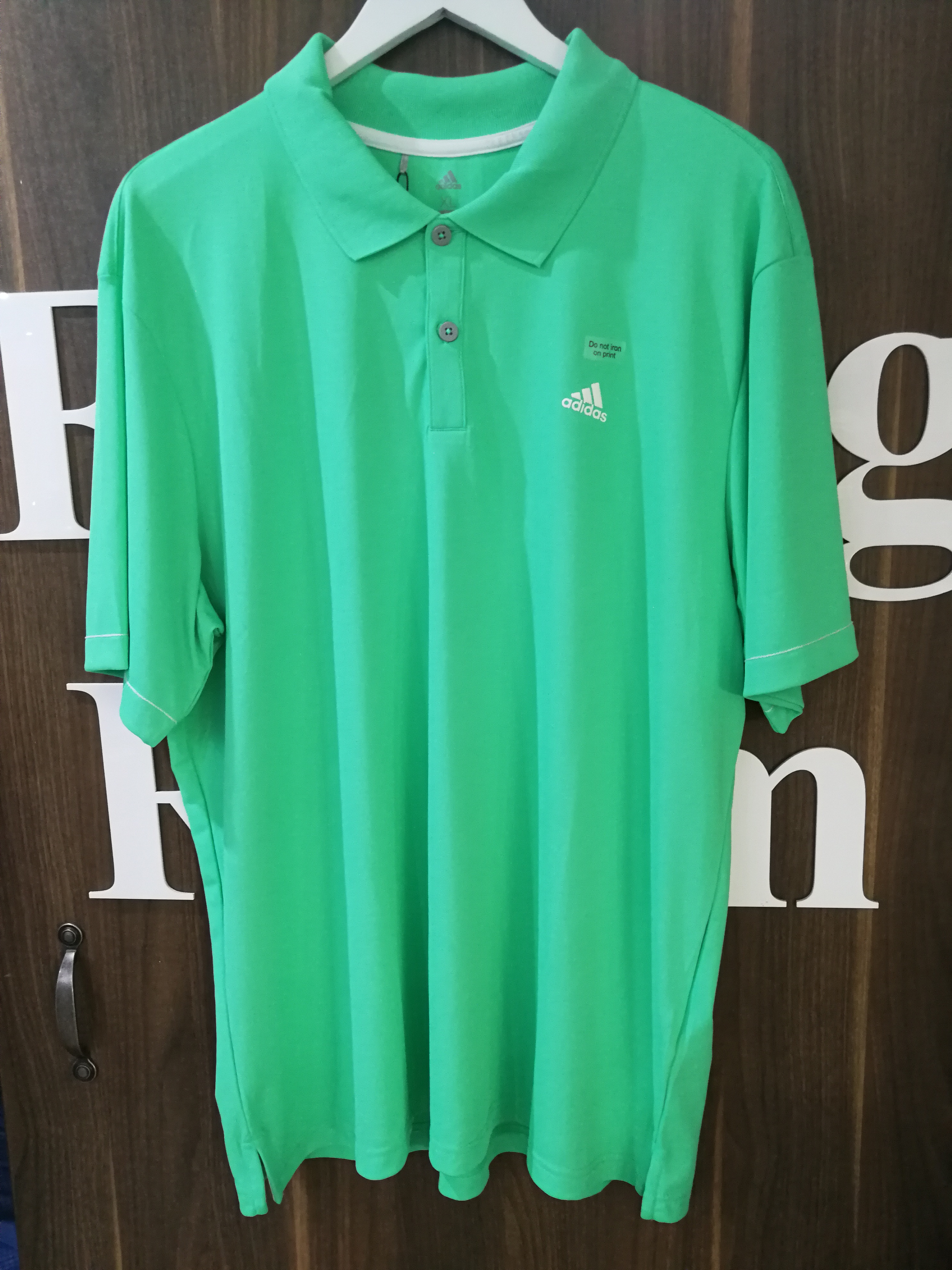 green adidas golf shirt
